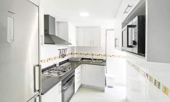 Castello de la Plana Apartment | Elegant 4-Bed Retreat Near Train Station for Families