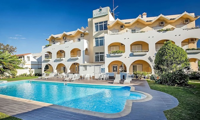 Figueiral House | Relax at Our Cozy Hotel with Free Breakfast & Two Pools!