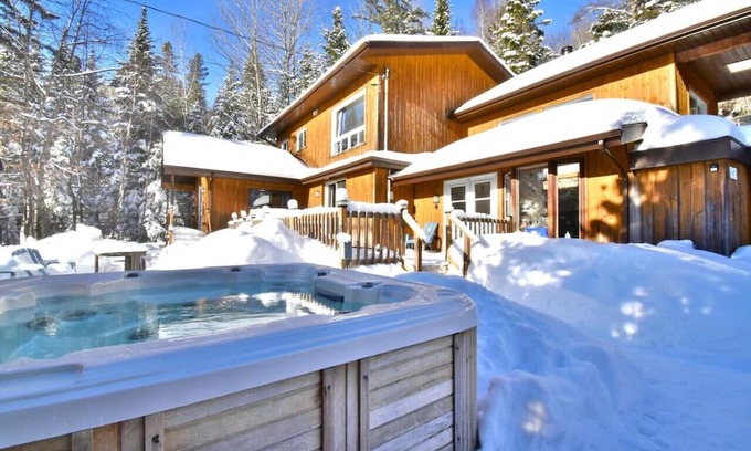 Sainte-Lucie-des-Laurentides Ski Chalet | Unforgettable Spa Retreat with Kayaks and Ocean Views
