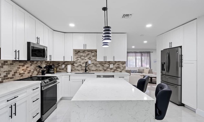 Oakland Park House | Elegant Seaside Retreat with Oceanfront Views & Spa