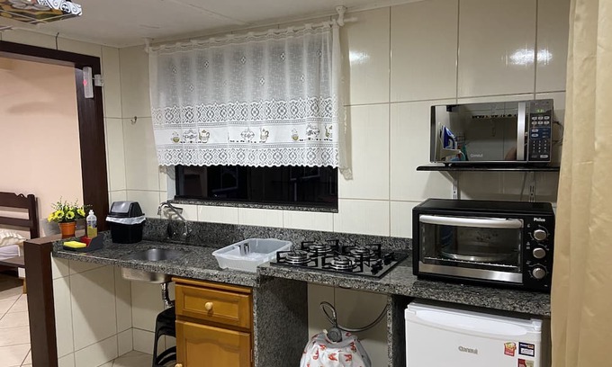 Centro Apartment | Cozy Loft in Blumenau with Garage for Family Getaways