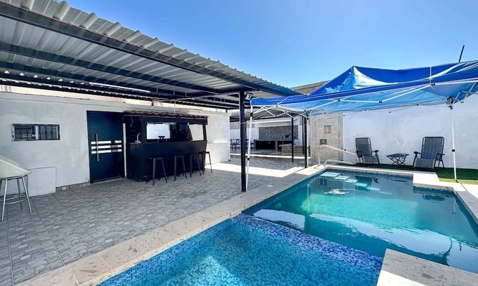 Nueva Esperanza House | Discover the Perfect Town Gem Getaway with Pool and Kitchen