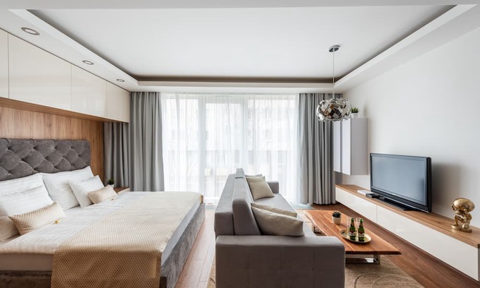 Karlin Apartment | Osko Apartments: Family-Friendly Retreat with Spa and Kitchen