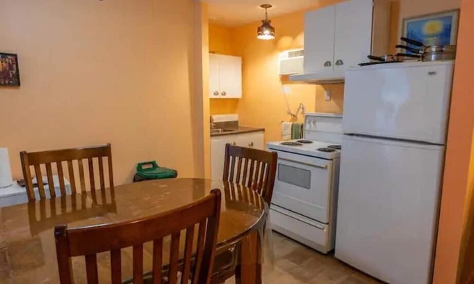 Mauricie House | Family Room with Pet-Friendly Amenities for Memorable Stays
