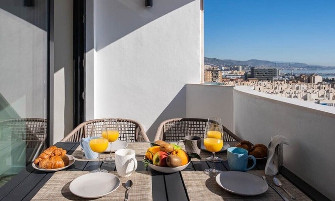 Parque Ayala Apartment | Inviting Top Floor Sea View & Terrace Experience in Malaga