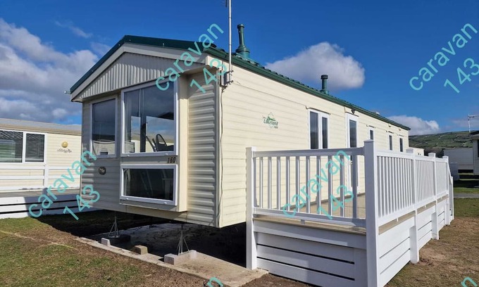 Talybont House | Comfortable 3-Bedroom Caravan at Family Holiday Park