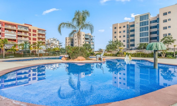 Mil Palmeras Apartment | Gran Terraza Vistas Mar: Oceanfront Retreat with Pool & Wi-Fi