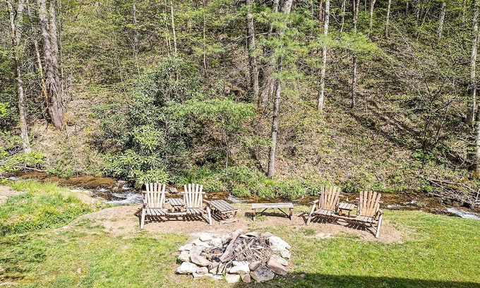Maggie Valley Cabin | Inviting Creekside Retreat with Pool and Breakfast Included