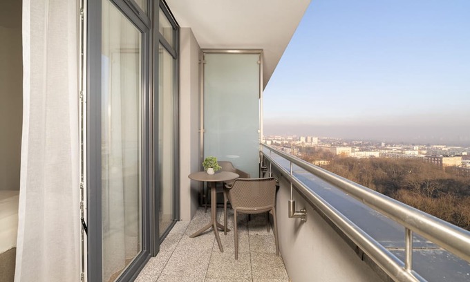 Poznan Apartment | Modern Beige Apartment in Poznań with Family Amenities