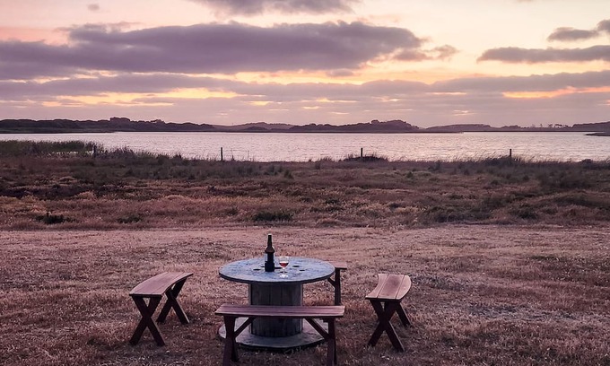 Bonney House | Discover Waves & Whimsy: Pet Friendly Lakefront Retreat