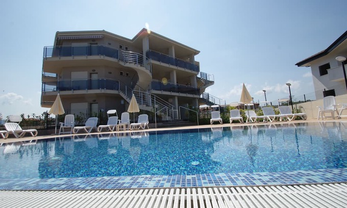Localita Piana di Vadi Apartment | Relaxing Residence Apartment with Pool for Families