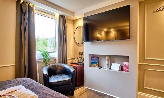 Tyndrum Hotel | Peaceful Highland Escape with Garden Views and Mountain Backdrop