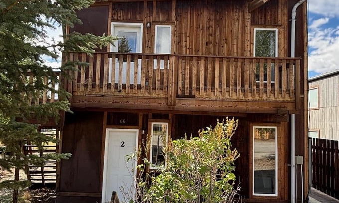 Pinedale Apartment | Large windows bring the outside in.