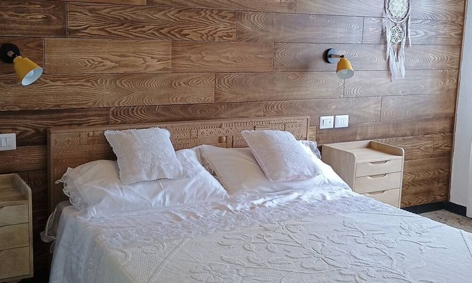 Villagrande Strisaili House | Holiday Home 'Sa Omu 'Eccia' with Sea View and Private Terrace