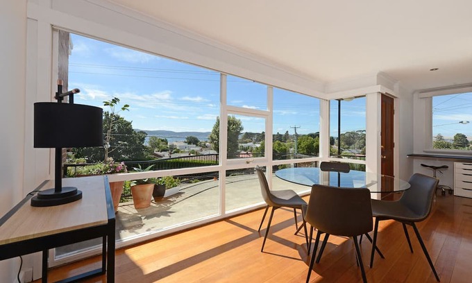Sandy Bay Apartment | Panoramic water views, sunny and private - walk to beach, cafes and shops