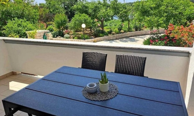 Rab Apartment | One bedroom apartment with terrace and sea view Palit, Rab (A-24303-d)