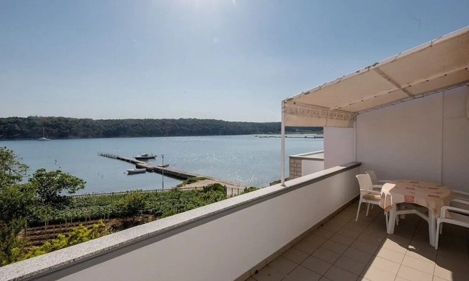 Rab Apartment | One bedroom apartment with terrace and sea view Palit, Rab (A-24303-c)