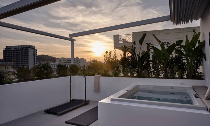 Khalandrion Apartment | Dazzling Athens Maisonette | Ialysos Maisonette | 2 Bedrooms | Private Furnished Balcony with Outdoor Dining Area and Sunbeds | Private Outdoor Jacuzzi | Exercise Equipment | Prime Location | Chalandri