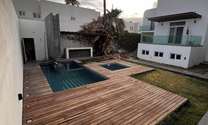 Delicias House | Spacious 4-bedroom house with WiFi, Pool, fitness room in welcoming Delicias