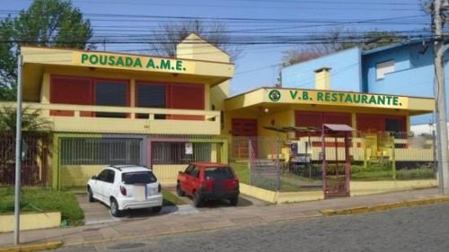 Nossa Senhora de Lourdes Apartment | Budget-Friendly Kitnet near UCS with Breakfast Included