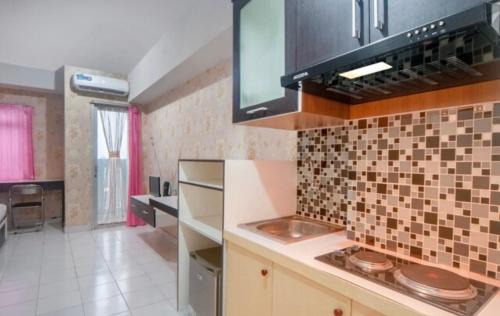 Dramaga Apartment | Exceptional Family Retreat at Dramaga Tower by Rezky 2