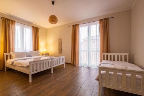 Ostroda Apartment | Cozy Ostróda Green Apartment with Pool & Ocean View