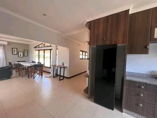 Ras Makamaiwe Bed & Breakfast | Family-Friendly Kingtech Inc Apartments with Pool & Breakfast