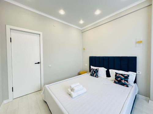 Almaty Apartment | Family-Friendly Retreat at Тургут Озала 261 with Pool