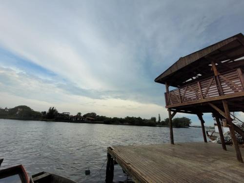 Passo de Torres House | Stay at Casa as Margens do Manpituba - Family & Pet Friendly