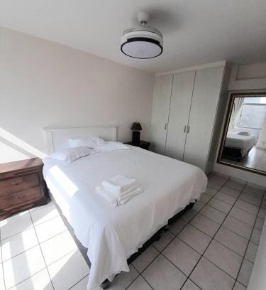North Beach Apartment | Beachside Bliss at Oceanic 84 Durban with Pool & Family Fun