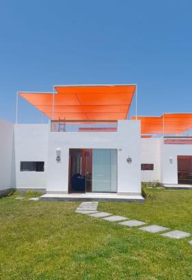 San Antonio House | Beachfront Getaway at Casa de Playa ALVARO - Kalua