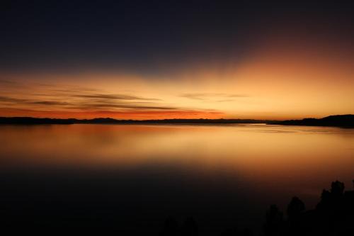 Isla Amantani Bed & Breakfast | Budget-Friendly Sunset Lodge Amantani for Family Getaways