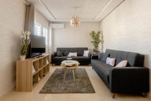 Sale Apartment | Elegant Oceanfront Apartment in Salé with Pool Access