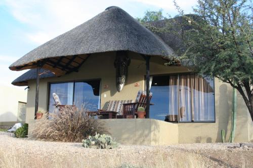 Windhoek Rural House | Relax at Arub Chalet Farm Stay: Pool and Accessible Amenities